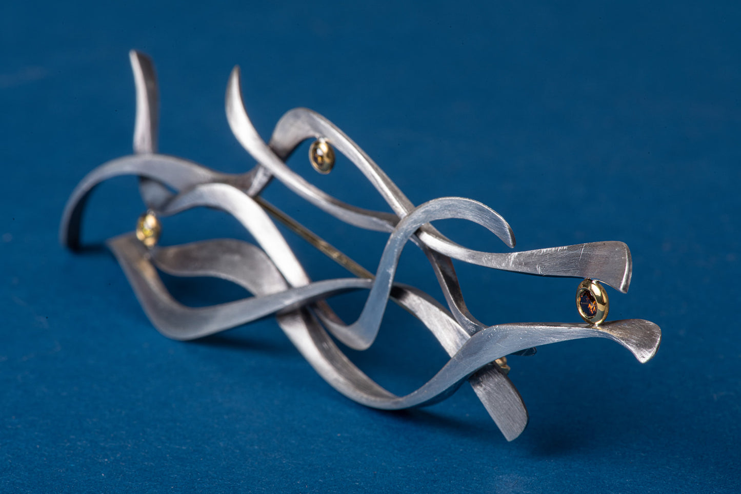 abstract brooch