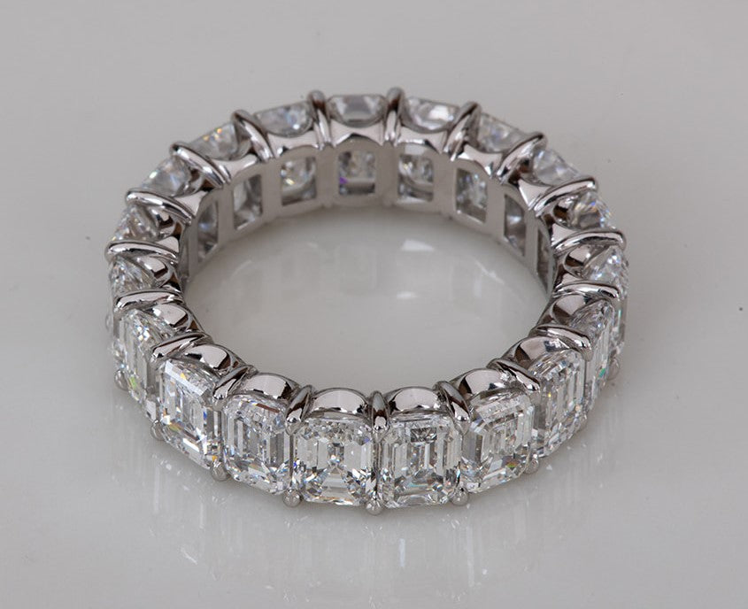perfect emerald cut diamond infinity ring in platinum