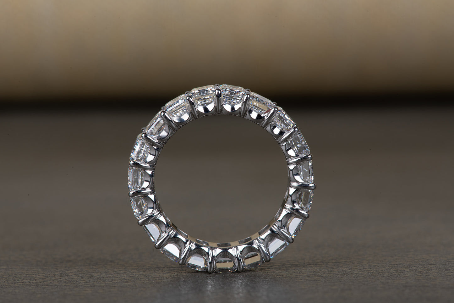perfect emerald cut diamond infinity ring in platinum