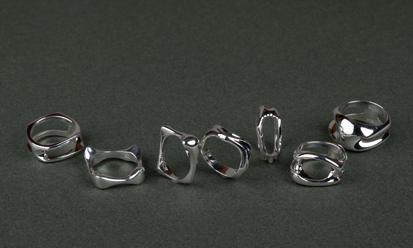modernist abstract sterling silver rings à la Henry Moore