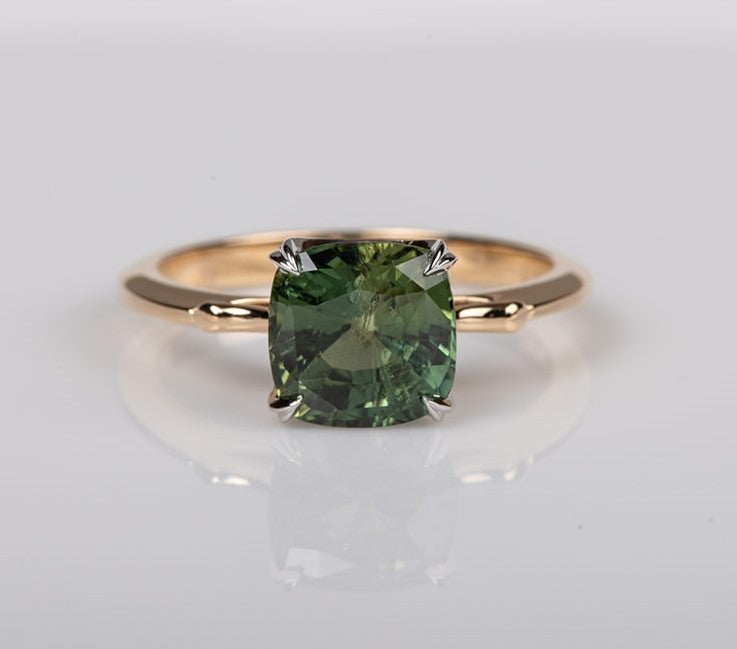 Single stone green sapphire ring