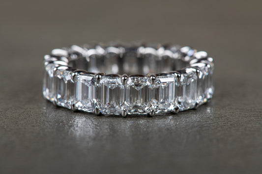 perfect emerald cut diamond infinity ring in platinum