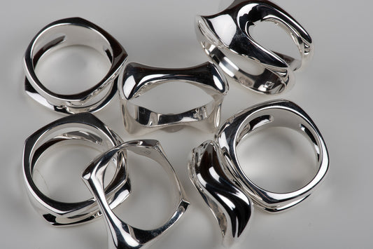 modernist abstract sterling silver rings à la Henry Moore