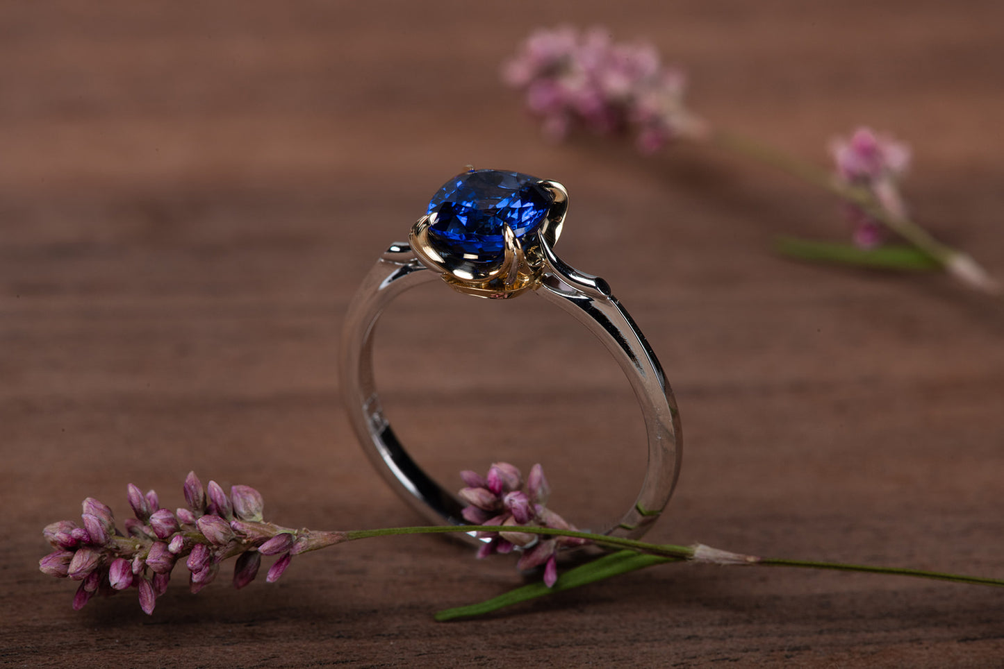 blue sapphire set in gold with platinum shank ring 